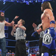 Luke Harper (left), AJ Styles